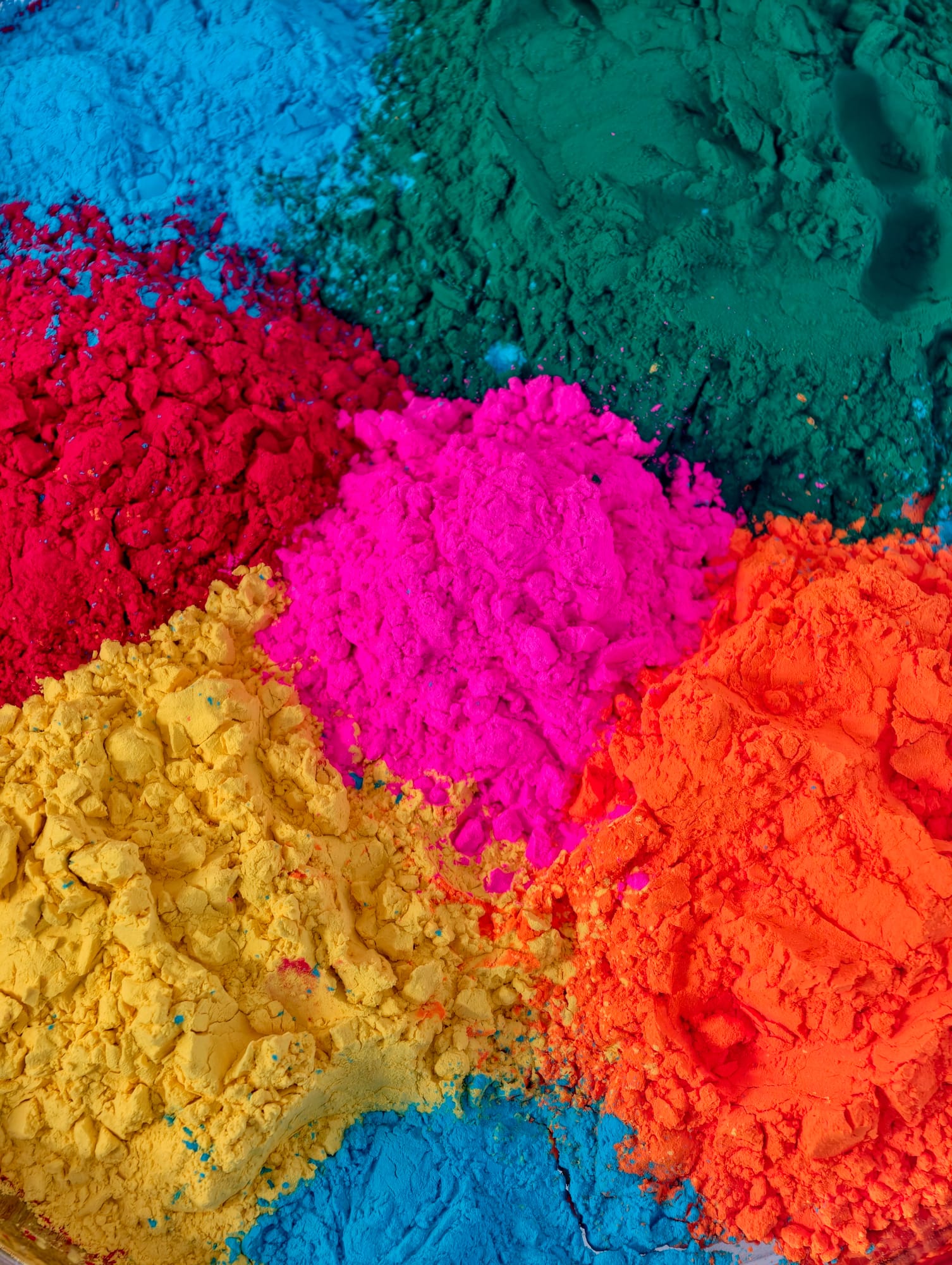 Loose textile dye pigment in vivid colour, close up