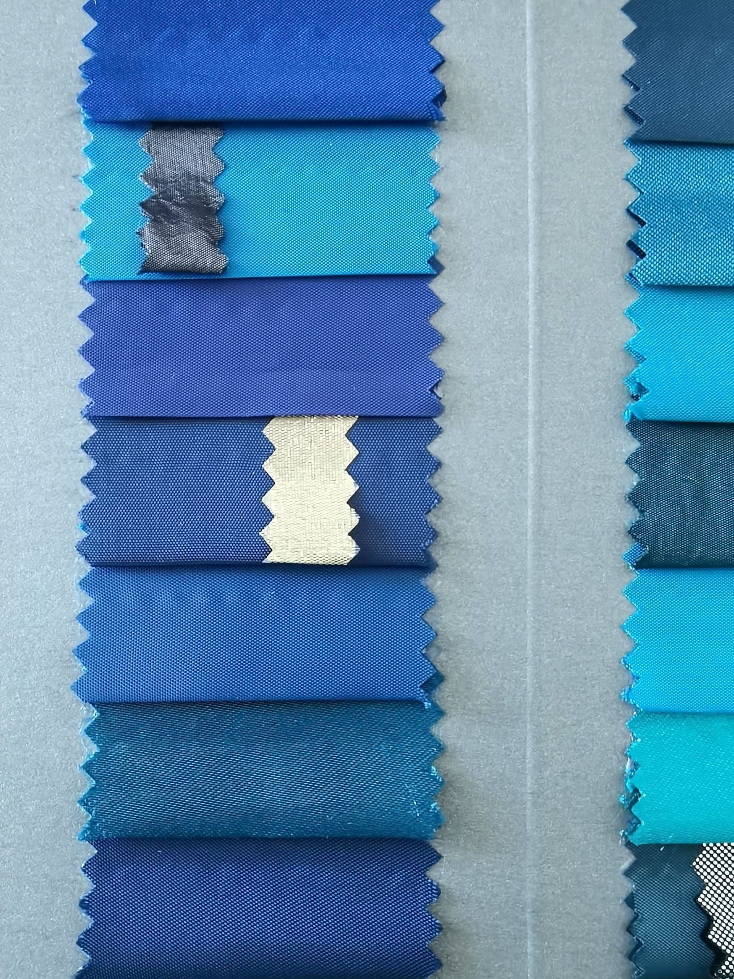 Dyed fabric colour swatches in a range of shades
